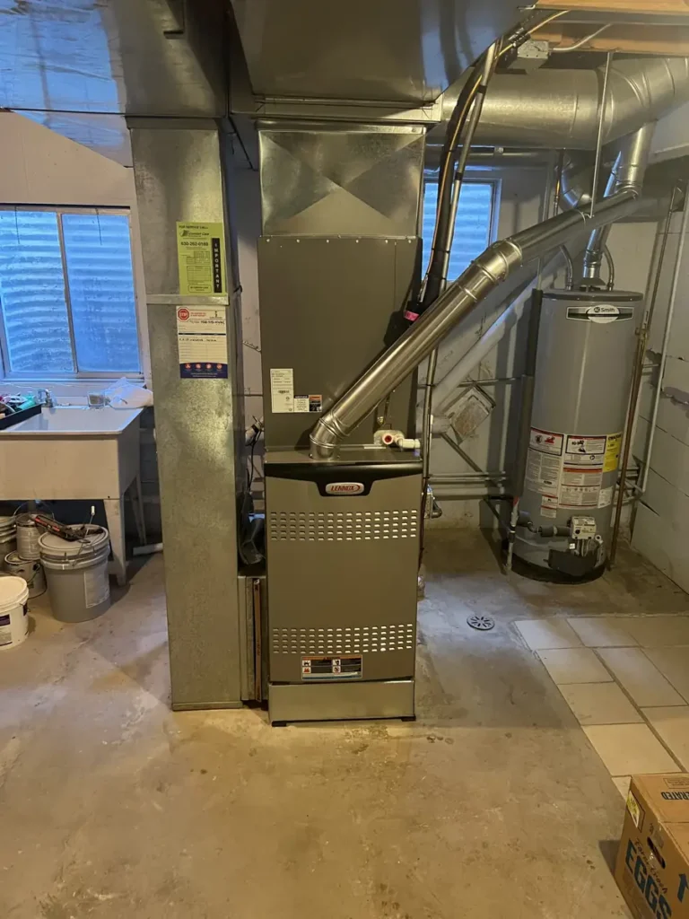 New Lennox furnace and coil with new sheet metal and venting in a Carol Stream, IL basement
