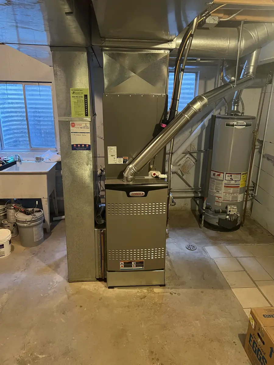 New Lennox furnace and coil with new sheet metal and venting in a Carol Stream, IL basement