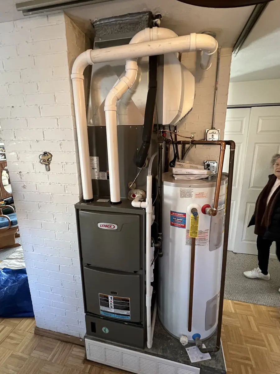 New Lennox high-efficiency furnace with a whole-house humidifier and water heater in Schaumburg, IL