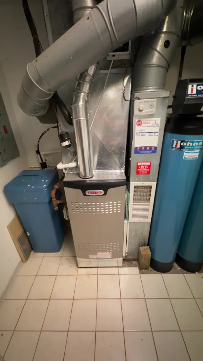 New Lennox furnace installed in a tiled utility room in Glen Ellyn, IL