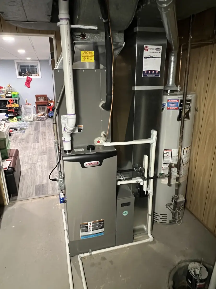 New Lennox high-efficiency furnace with a UV light, condensate piping and new sheet metal in a Carol Stream, IL basement