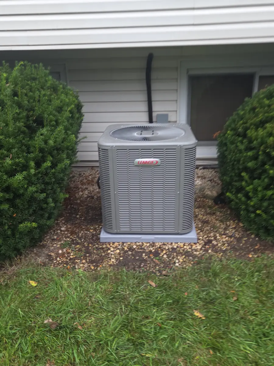New Lennox air conditioner installed on a new pad at a Hanover Park, IL home