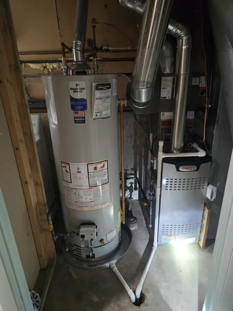 New Lennox furnace and Bradford White water heater installed by Pure Comfort in a Hanover Park, IL utility closet
