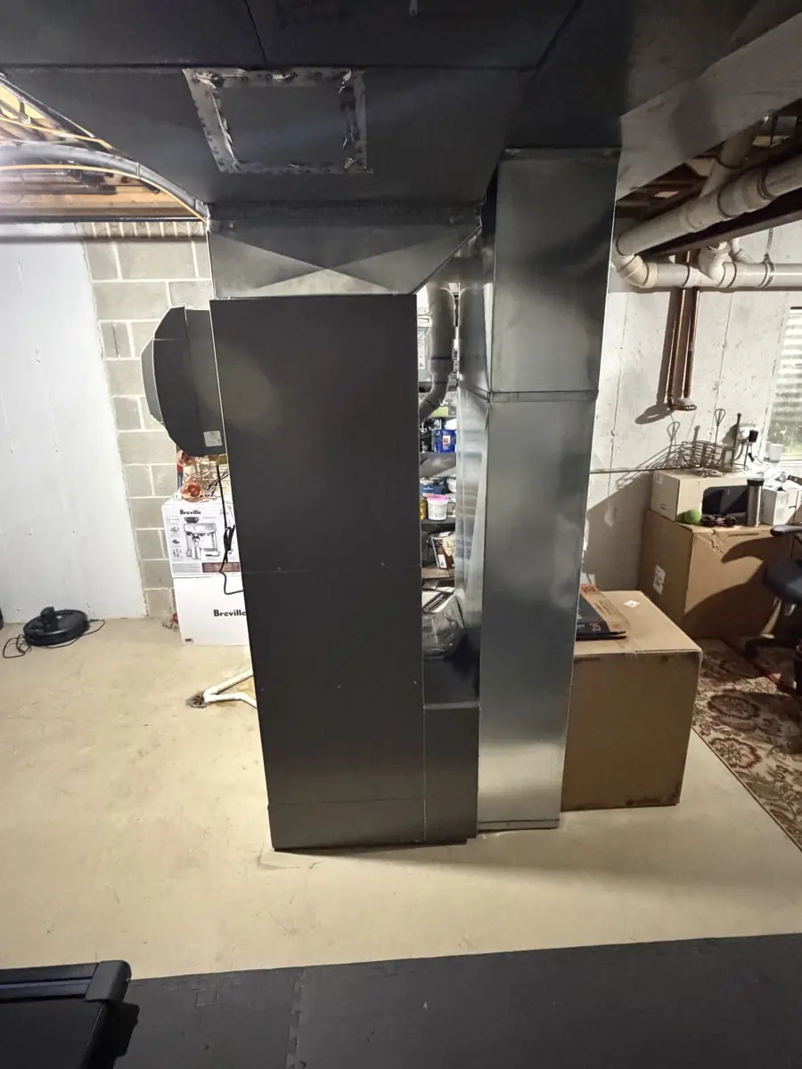New supply and return sheet metal around a furnace replacement in a Hoffman Estates, IL basement