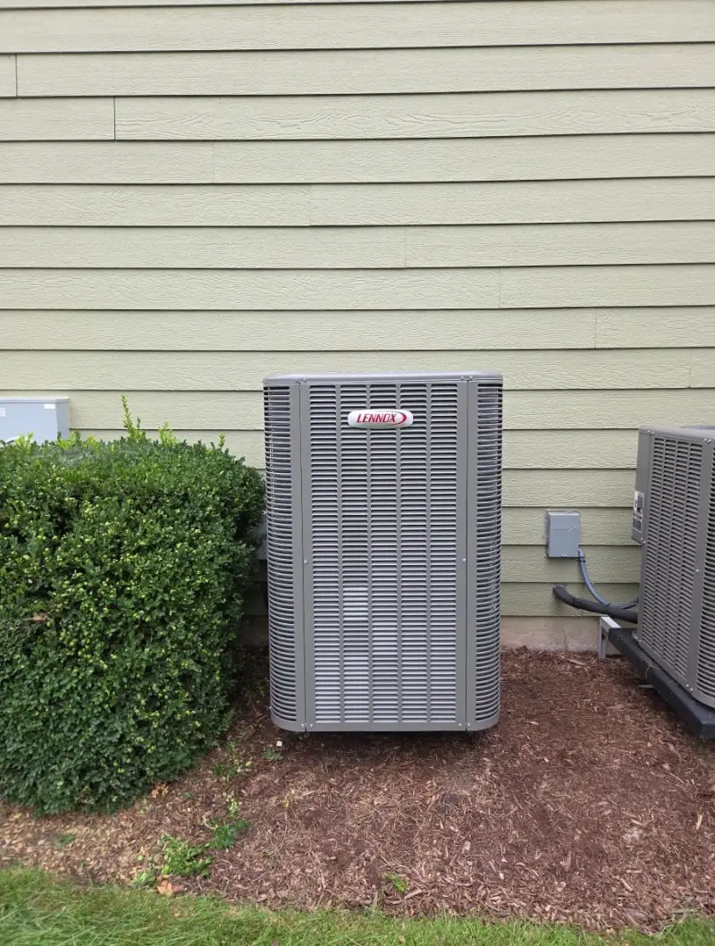 New Lennox outdoor air conditioner installed in St. Charles, Illinois by Pure Comfort Heating & Cooling