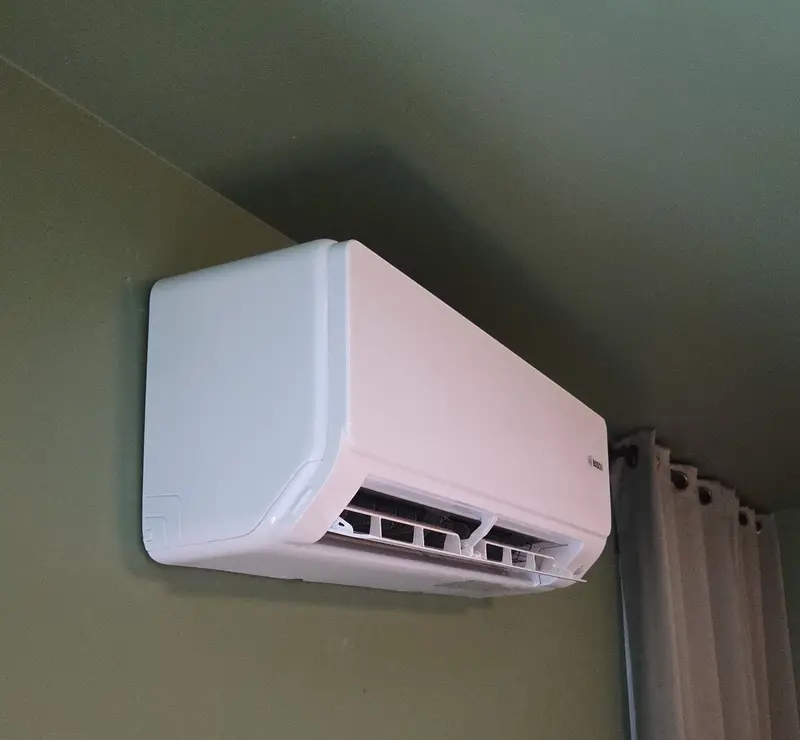Bosch ductless wall unit installed by Pure Comfort in a Glen Ellyn, IL bedroom