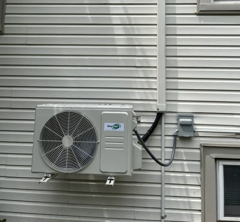 Wall-mounted ductless mini-split outdoor unit installed by Pure Comfort in Roselle, IL