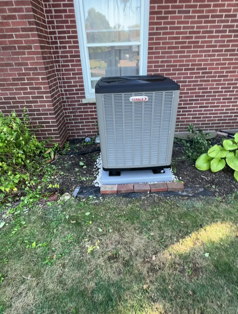 New Lennox outdoor unit installed by Pure Comfort at the same home