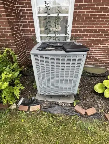Old outdoor unit before replacement by Pure Comfort