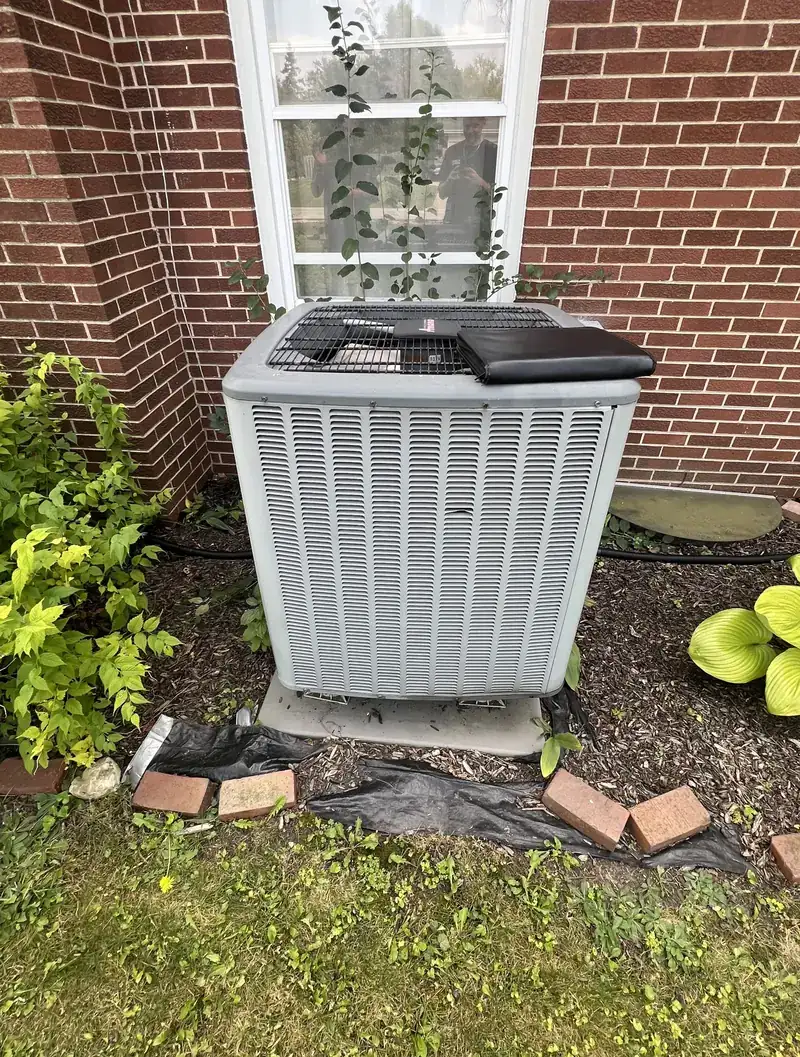Old outdoor unit before replacement by Pure Comfort