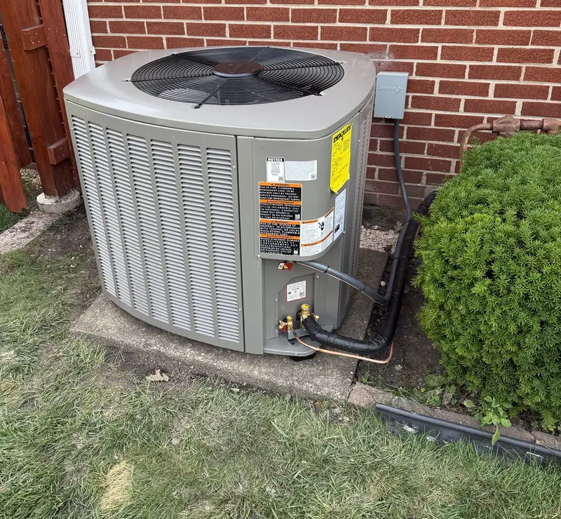 New Lennox air conditioner with new line set beside a brick home in Elmhurst, IL