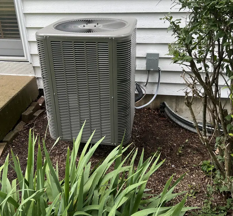 New Lennox air conditioner installed by Pure Comfort beside a South Elgin, IL home