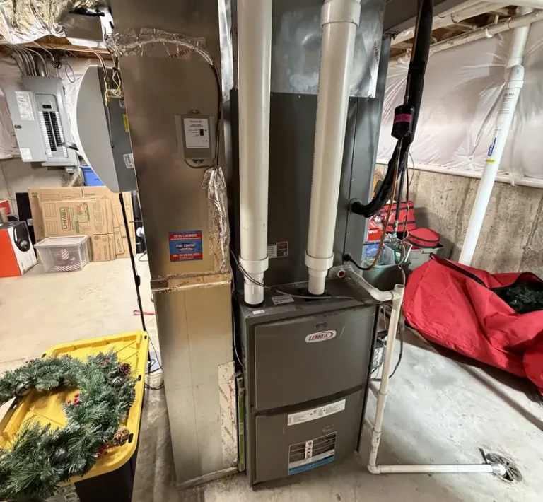 New Lennox furnace with humidifier installed by Pure Comfort in a Carpentersville, IL basement