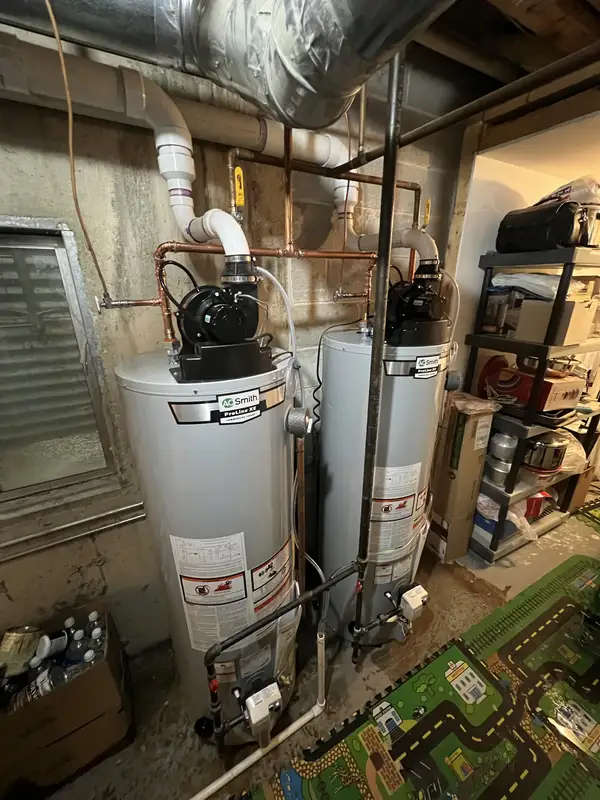 After: two new A.O. Smith ProLine XE power-vent water heaters installed by Pure Comfort in Des Plaines, IL